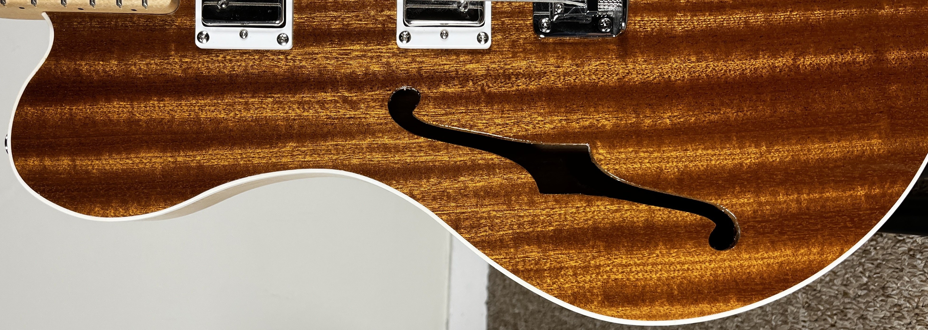 Close-up of guitar body and grain